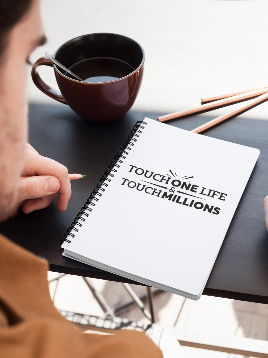 image-958948-mockup-of-a-notebook-placed-on-a-table-next-to-colored-pencils-24187-16790.w640.png